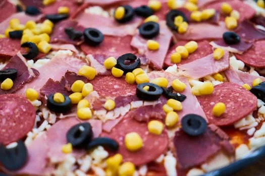 meat lovers pizza with bacon and sausage