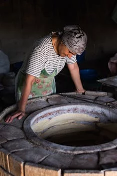 Tony Romano head chef in traditional pizza kitchen uniform